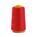 Close-up of industrial red polyester sewing thread on yellow spool for machines - Approx 100g / Red