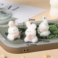 Detailed view of white flocked bunny charms with dimensions for DIY accessories - Rabbit with Carrot