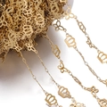 Detailed macro of gold butterfly and crown link chains on a spool for DIY jewelry - 1 Meter / Gold Crown Butterfly (Butterfly Approx 9.5x14mm)