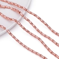Close-up of rose gold bamboo-shaped spacer beads for DIY jewelry making and craft design - 1 Strand (Approx. 50 Pcs) / Rose Gold