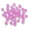 Macro view of purple AB color coated acrylic round beads for DIY jewelry making - Purple