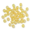 Macro shot of light yellow AB iridescent acrylic round beads for DIY jewelry making - Yellow
