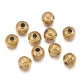 Macro view of ten 18k gold-plated stainless steel beads with hammered texture and drill holes - B-1 (4mm) Hammered Texture / 10 Pieces/Pack (Approx. 3g) / Gold