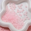 Vue détaillée de perles roses translucides en forme d'abaque pour création de bijoux DIY - Perle Rondelle en Verre (AC4486) / Pack de 100 / Rose Clair / 3*6.5mm