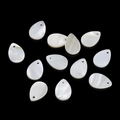 Macro view of teardrop natural shell charms with iridescent luster on black background - Water Drop