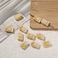 Schattige hars varkensbedeltje met marmeren textuur voor DIY sieraden en handwerk - Varken / 10 Stuks Verpakking / Amber Wit