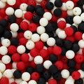 Macro view of 6mm matte finish acrylic beads in red, black, and cream for DIY crafts - Red And Black