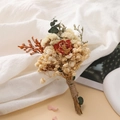 Detailed close-up of a mini dried flower bouquet with a red rose on white linen - Forget-me-not Red Rose