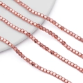 Macro detail of 4mm rose gold hematite cube beads for DIY jewelry making and crafts - 4*4mm (Approx. 95 Pcs/Strand) / Polished Rose Gold