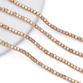 Macro detail of matte gold square cube beads for DIY jewelry making and bead strings - Matte KC Gold
