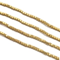 Macro view of rose gold hematite cube spacer beads for DIY jewelry making chains - Matte Gold