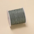 DIY jewelry making cord 0.4mm in sage green color wound on white plastic spool - Dark Gray