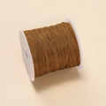 Deep brown 0.4mm polyester cord on a white spool for DIY jewelry and craft weaving - Khaki