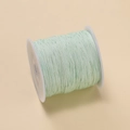 Light green 0.4mm polyester cord for DIY jewelry on a white spool for handicrafts - Light Mint Green