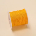 Bright yellow 0.4mm polyester cord on a white spool for DIY jewelry and hand weaving - Yellow