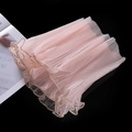Detailed macro view of pink pleated tulle fake cuffs with elegant gold wave edge embroidery - Korean Pink Gold Edge
