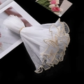Detail of white wavy tulle bouquet wrap with elegant gold pearl edge and flower decor - White Gold Edge