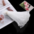 Macro shot of white pleated organza lace trim with wavy edges for bouquet decoration - White Plain Edge