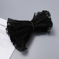 Macro detail of black pleated wavy gauze ribbon with pearl edges for bouquet decoration - Black Double Line Edge