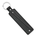 Detail view of a black PU leather keychain with lychee texture and silver metal ring - Black