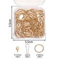 Detail of DIY keychain kit with lobster clasps, hooks and rings in a clear storage box - KC Gold