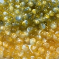 Golden yellow 8mm mermaid resin beads with cats eye effect and shimmering finish - Yellow
