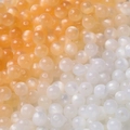 DIY resin light-changing round beads with orange to white gradient and glossy cat-eye finish - White to Orange
