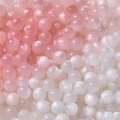 DIY jewelry beads in pink and pearl white with cat eye effect for necklaces - White to Pink