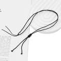 Close-up of minimalist black braided cord necklace with adjustable sliding knots for pendants - Thin Flat Knot (Black) / Length approx 44cm / Black