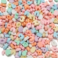 Close-up of macaron colored resin alphabet and number beads for DIY crafts - (Approx. 8-14mm) 10 Pcs Approx. 7.5g / Solid Mixed Colors