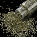 Close-up of olive green iridescent glass shards poured from a clear bottle for DIY crafts - Deep Olive Green / 30ml Bottle