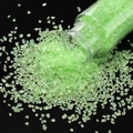 Macro view of light green iridescent glass gravel pouring from a clear bottle - Light Green / 30ml Bottle