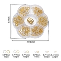 Macro detail of 3-8mm jewelry jump rings set in petal organizer with sizing information - Mixed Gold and Silver