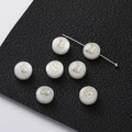 Macro shot of natural shell round beads with gold letter B for DIY jewelry making - 2 Pieces (8.5x4.5mm) / Letter B (Pearl White)