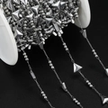 Detailed macro of silver stainless steel geometric chain with pyramid charms for DIY jewelry - 1 Meter / Steel Color Triangle (Triangle Approx 6x6.5mm)
