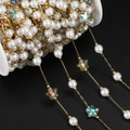 Macro shot of 18K gold star chain with pearls and colorful acrylic stars on spool - Star Artificial Pearl Hand-made Chain (JCXZ-132) / 1m / Gold