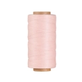 Macro detail of 0.8mm light pink waxed polyester thread for leather crafting and DIY - Light Pink (Style 01)