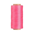 Close-up of fluorescent pink 0.8mm waxed polyester thread on a brown kraft paper spool - Fluorescent Pink (Style 04)