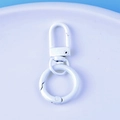 Close-up of white lacquered lobster clasp and round spring ring for DIY keychains - White