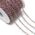 Macro shot of purple enamel twisted oval chain links on gold-plated stainless steel spool - 1 Meter/Pack / Purple