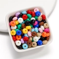 Close-up of 8mm candy color acrylic beads in a ceramic dish for DIY jewelry making - 50 Pieces/Pack (4.5x8mm) / Mixed Random