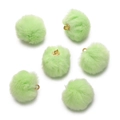Detailed view of light green faux mink pom-poms with golden loops for DIY jewelry - Green