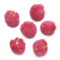 Macro detail of six fluffy rose pink faux mink fur pompoms with gold metal rings - Watermelon red