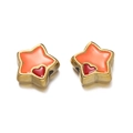 Macro shot of stainless steel star charms with orange enamel and red heart details - 01 Orange Star