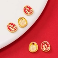 Macro shot of gold-plated alloy pendants with Fu character and cute pig enamel patterns - 2 Pcs/Set / Pig