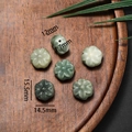 Macro detail of lotus shaped bodhi root beads with precise size measurements in mm - Style 08 Cyan Green Flower (14.5*15.5mm)