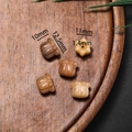 Detail view of brown tulip and floral shaped beads for DIY jewelry making and crafting - Style 13 Dark Brown Carved (11*12.5mm)