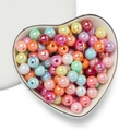 Mix of colorful AB plated acrylic round beads inside a white heart-shaped ceramic bowl - 6mm (100 Pieces/Pack) / Mixed Random