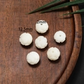 Detailed macro view of 12.5mm carved flower beads for DIY jewelry making - Style 20 White Round Flower (12.5mm)