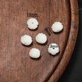 Macro detail of 10mm white lotus-shaped carved beads for DIY jewelry making - Style 25 White Lotus (8*10mm)